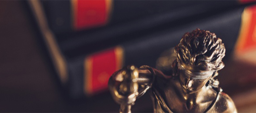 Statue Of Justice With Law Books